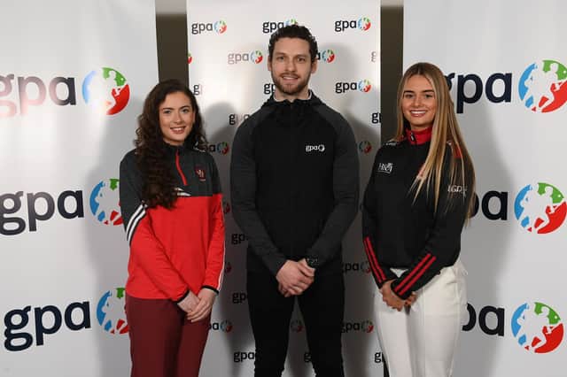 Pictured with Gaelic Players Association chief executive Tom Parsons are Derry ladies footballers, Rachel McAllister and Ella-Rose Sainsbury, right, during the announcement event at the Radisson Blu Hotel at Dublin Airport in Dublin. (Photo by Stephen McCarthy/Sportsfile)