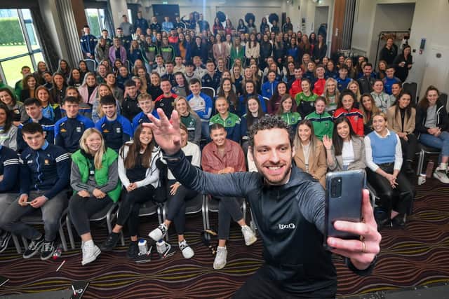 Pictured is Gaelic Players Association Chief Executive Tom Parsons as he takes a selfie with attendees during the GPA Scholarship Announcement Event, at the Radisson Blu Hotel at Dublin Airport in Dublin. (Photo by Stephen McCarthy/Sportsfile)