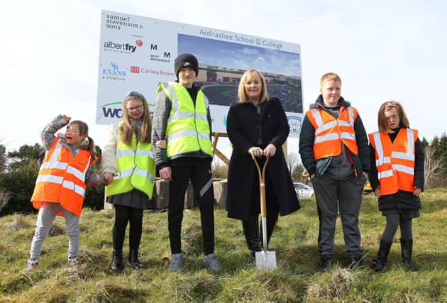 Education Minister Michelle McIlveen with pupils from Ardnashee School and College at the sod cutting ceremony for the new £34 million school on the former Foyle College site at Northland Road.