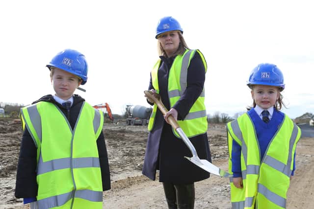 Education Minister Michelle McIlveen with pupils Oisin and Katie from Listress Primary School and Mullabuoy Primary School at the sod cutting ceremony for the new £4.7 million Our Lady of Fatima Primary School.Credit ©Lorcan Doherty