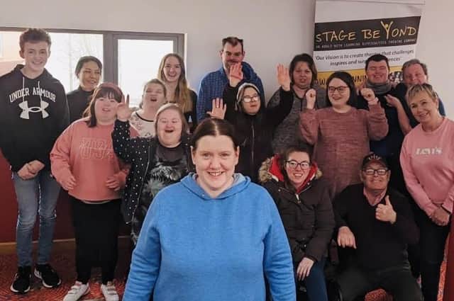 Stage Beyond members show their appreciation for colleague Bernie Shiels, who was recently appointed Chair of the local theatre company's Board of Trustees.