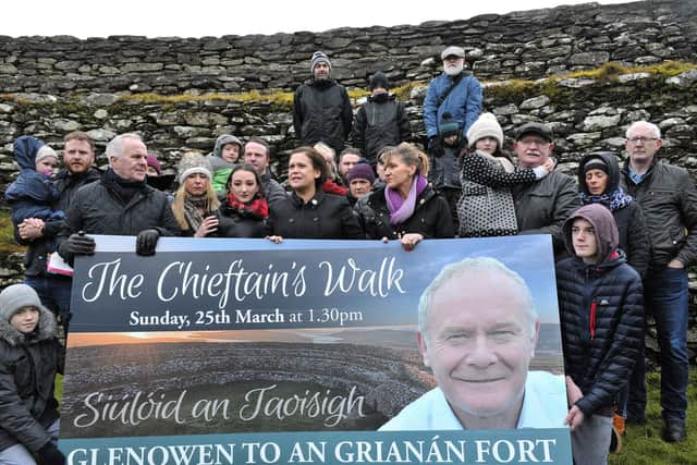 Mary Lou McDonald, with members of the McGuinness family and supporters at a previous launch of ‘The Chieftain’s Walk’, an annual charity walk in memory of Martin McGuinness, at Grianan of Aileach. DER0518GS027