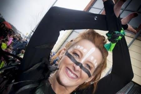 Carie Logue-Houston, Studio 2 Dance Facilitator, leading by example during the St. Patrick’s Day Parade on Friday.