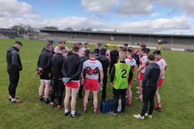 Derry boss Rory Gallagher talks to his players after their defeat of Clare  in Ennis last time out.