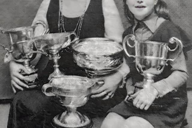 Carita Kerr Marie-Louise Muir pictured in 1977 when Carita completed a clean sweep of all the major singing competitions at Feis Doire Colmcille. Marie-Louise was competing for the first time and was also a prize winner.