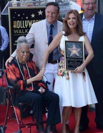 Roma pictured receiving her star on Hollywood Boulevard with the co-stars of the hugely popular TV show ‘Touched by an Angel’.