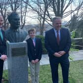 The Taoiseach Micheál Martin with Aidan and Daragh Hume at the unveiling of a new bust in honour of the late John Hume in Washington D.C.