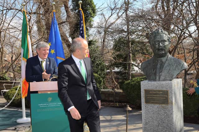 The Taoiseach Micheál Martin with the Ireland's Ambassador to the USA Dan Mulhall at the unveiling of a new bust in honour of the late John Hume in Washington D.C.
