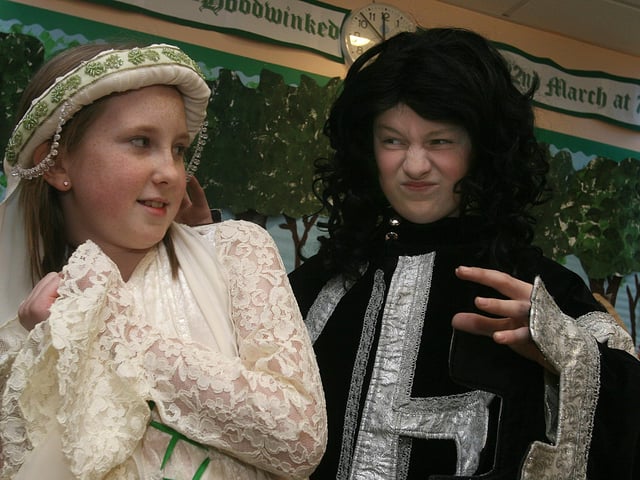 Laura Smallwoods plays ‘Maid Marion’ and Michael Gardiner, as ‘The Sheriff’, in the school play ‘Hoodwinked’, put on by pupils at Lisnagelvin Primary School.  (2103T08).