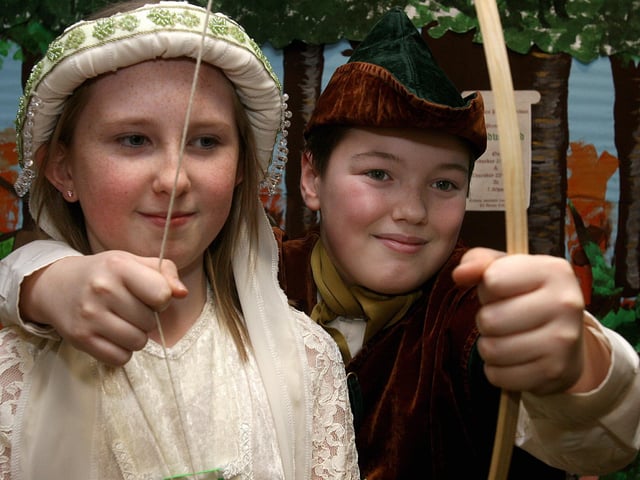 Laura Smallwoods plays ‘Maid Marion’ and Aaron Feathers as ‘Robin Hood’, in the school play ‘Hoodwinked’, put on by pupils at Lisnagelvin Primary School.  LS13-516MT.