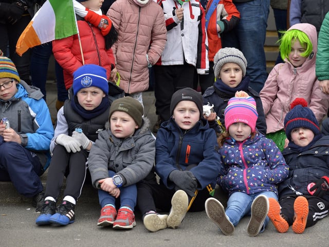 These children were ‘well happed-up’ for the St. Patrick’s Day festivities in Buncrana on Saturday afternoon last. DER1118GS014