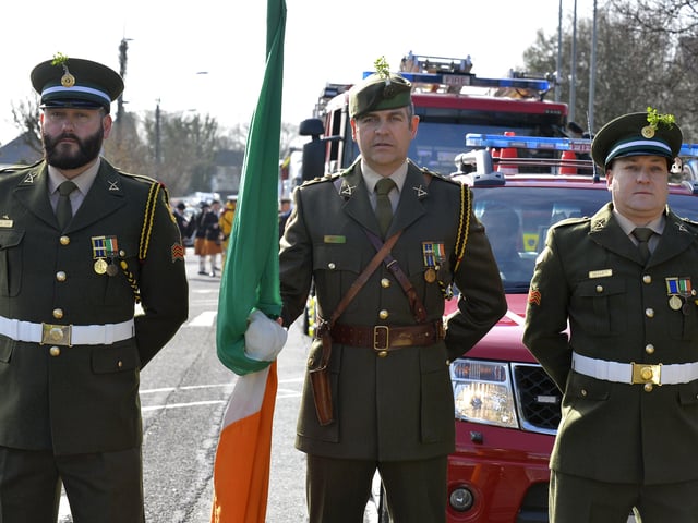 Corporal McCann, Captain Magee and Corporal  Hegarty, from the Defence Forces, at the Buncrana St Patrick’s Day parade. DER1219GS-020