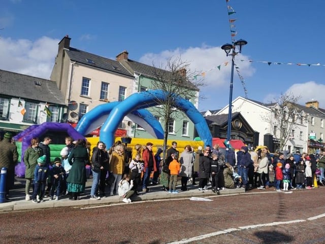 Spectators waiting for the parade to pass.