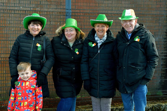 Locals on their way to St Patrick’s Day parade in the city. Photo: George Sweeney / Derry Journal. DER2211GS – 102