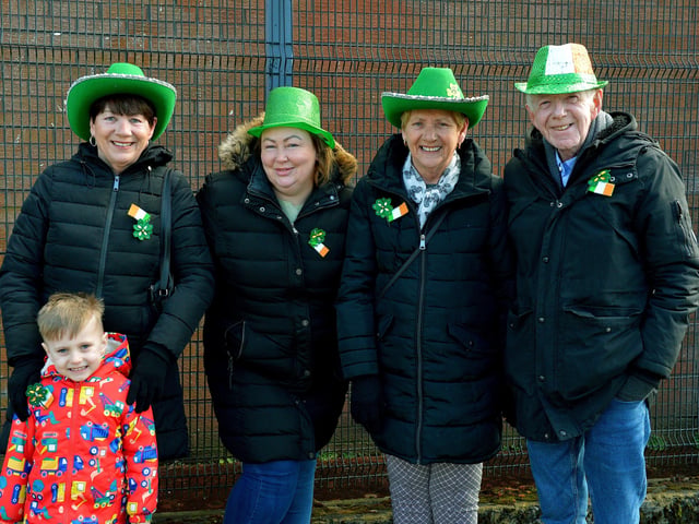Locals on their way to St Patrick’s Day parade in the city. Photo: George Sweeney / Derry Journal. DER2211GS – 102