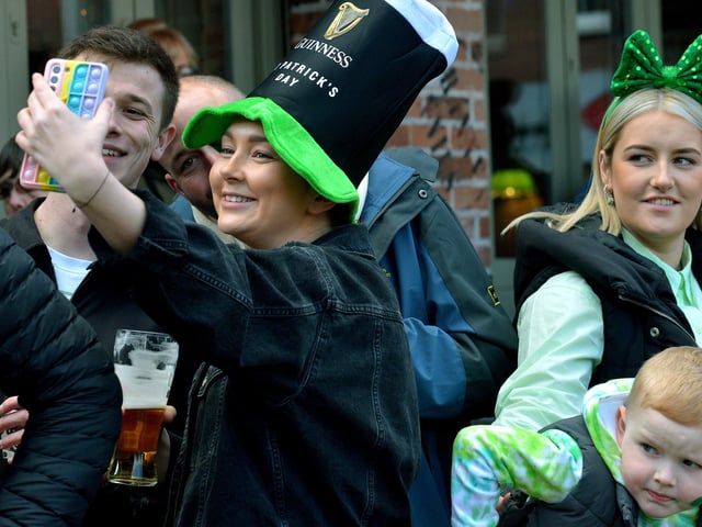 Spectators at the St Patrick’s Day parade. Photo: George Sweeney / Derry Journal. DER2211GS – 112