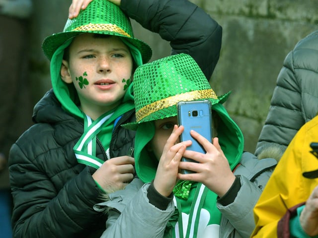 Spectators at the St Patrick’s Day parade. Photo: George Sweeney / Derry Journal. DER2211GS – 117