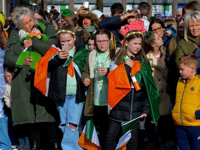 Spectators at the St Patrick’s Day parade. Photo: George Sweeney / Derry Journal. DER2211GS – 111