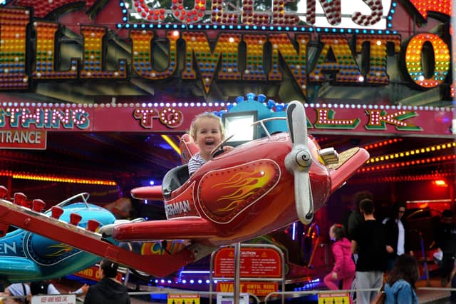 Darcy Davies, aged 2, thrilled to be at Cullen’s Amusements. Photo: George Sweeney DER2038GS – 032