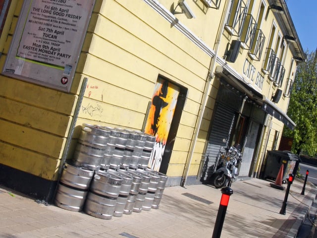 Sandinos Cafe Bar has outdoor seating and many people take to sitting on the infamous wall when the sun is shining. 3003JM71