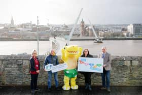 Pantosaurus pictured at Ebrington Square launching the virtual phase of the #PANTS campaign. From left are Leanne Brown, WHSCT, Dermot Harrigan, Derry and Strabane PCSP, Margaret Gallagher, NSPCC, and Paul Villa, PSNI.