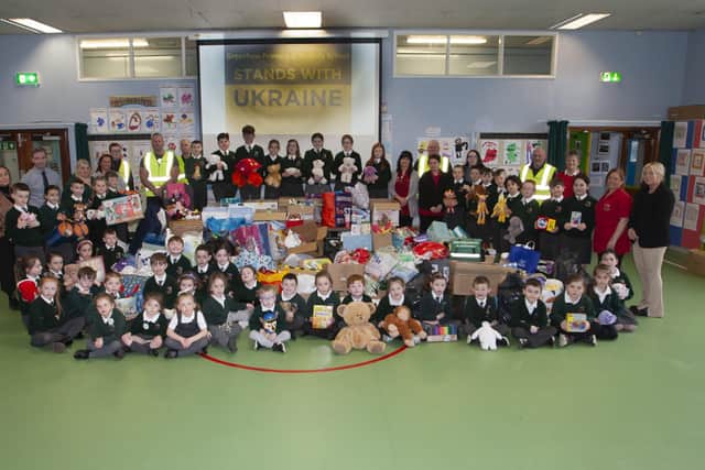 Pupil representatives, staff and drivers pictured on Tuesday before loading the 'Operation Ukraine Relief' items onto the waiting vehicles in the school's playground. (Photos: Jim McCafferty Photography)