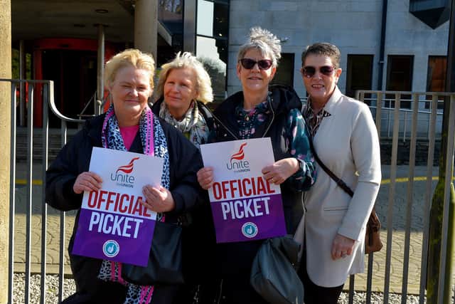 Council employees picket Derry City Council Offices on Strand Road on Monday afternoon as part of industrial action take over better pay demand. Photo: George Sweeney.  DER2212GS – 014