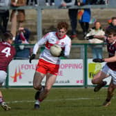 Derry’s Lachlan Murray evades a challenge from Galway’s Liam Silke and Paul Kelly at Owenbeg on Sunday. Photo: George Sweeney. DER2212GS – 002