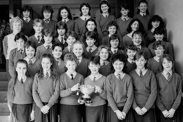 1985... Bronagh pictured in the centre of the front row holding the trophy in a Derry Feis prizewinning choir from St Mary’s Secondary School.