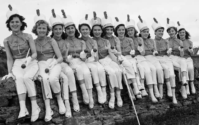 1956... Drum majorettes who headed the Long Tower Carnival parade through Derry. From left are K Doherty, T McGinty, D Doherty, R Campbell, D McLaughlin, F Duffy, P Gillespie, S Sheerin, R Campbell, A Barrett, B Murphy, M Gallagher and M Ferris.