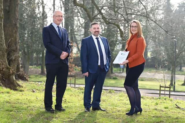 Minister Robin Swann (centre) and Professor Young with the Chair of the Northern Ireland Rare Diseases Partnership, Rhoda Walker.