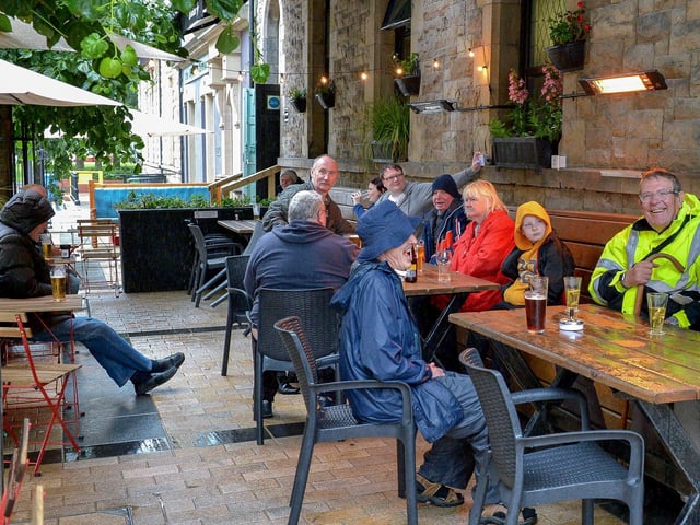 The Guildhall Taphouse has had a facelift recently but the heated outside area remains the same. It's pictured here on a not-so-sunny day DER2027GS – 003