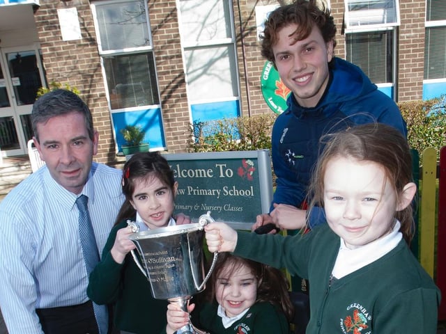 Steelstown Brian Og's player and school coach Donncha Gilmore with Greenhaw P.S. Principal Mr. Sean McLaughlin, his daughter Olivia, Amelie Curran and Nyla Moore. (Photos: Jim McCafferty Photography)