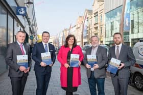 Junior Minister Declan Kearney; Glyn Roberts, Retail NI Chief Executive and Chair of the High Street Task Force - Influencing Policy and Strategy sub-group; Cathy Reynolds, Director of City Regeneration and Development, Place and Economy Department, Belfast City Council, and representing SOLACE (Society of Local Authority Chief Executives); Seamus McAleavey, Chief Executive of NICVA and member of the High Street Task Force, Developing Capacity sub-group; and Junior Minister Gary Middleton. (By Andrew Towe)