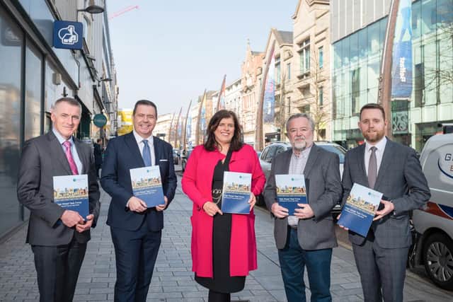 Junior Minister Declan Kearney; Glyn Roberts, Retail NI Chief Executive and Chair of the High Street Task Force - Influencing Policy and Strategy sub-group; Cathy Reynolds, Director of City Regeneration and Development, Place and Economy Department, Belfast City Council, and representing SOLACE (Society of Local Authority Chief Executives); Seamus McAleavey, Chief Executive of NICVA and member of the High Street Task Force, Developing Capacity sub-group; and Junior Minister Gary Middleton. (By Andrew Towe)