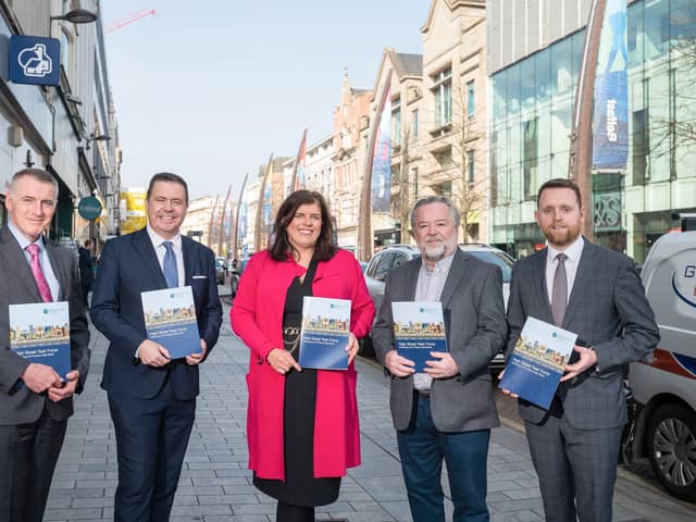 Junior Minister Declan Kearney; Glyn Roberts, Retail NI Chief Executive and Chair of the High Street Task Force - Influencing Policy and Strategy sub-group; Cathy Reynolds, Director of City Regeneration and Development, Place and Economy Department, Belfast City Council, and representing SOLACE (Society of Local Authority Chief Executives); Seamus McAleavey, Chief Executive of NICVA and member of the High Street Task Force, Developing Capacity sub-group; and Junior Minister Gary Middleton. (By Andrew Towe)