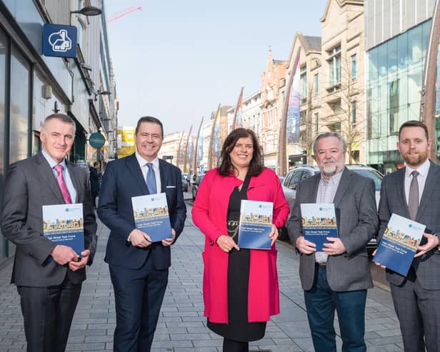 Junior Minister Declan Kearney; Glyn Roberts, Retail NI Chief Executive and Chair of the High Street Task Force - Influencing Policy and Strategy sub-group; Cathy Reynolds, Director of City Regeneration and Development, Place and Economy Department, Belfast City Council, and representing SOLACE (Society of Local Authority Chief Executives); Seamus McAleavey, Chief Executive of NICVA and member of the High Street Task Force, Developing Capacity sub-group; and Junior Minister Gary Middleton. (By Andrew Towe)