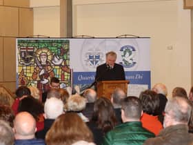 Jim Sharkey addressing students and assembled guests.