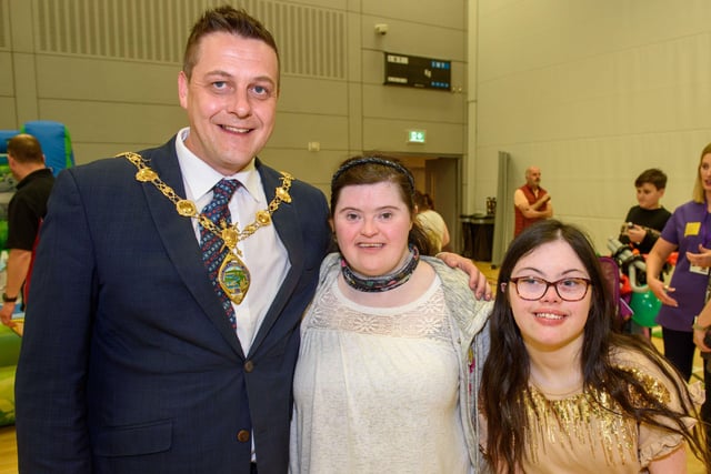 Emma Diver and Grace Cooke enjoying the fun at Foyle Arena with Mayor Graham Warke.
