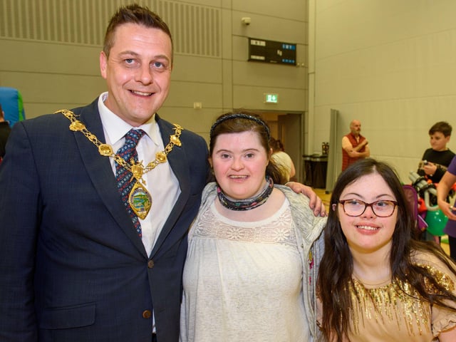 Emma Diver and Grace Cooke enjoying the fun at Foyle Arena with Mayor Graham Warke.