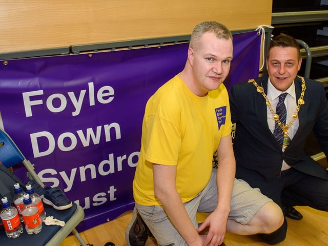Foyle Down Syndrome Trust volunteer Gary Logue with Mayor Warke.