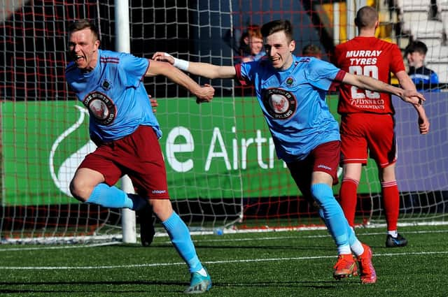 Institute's Ian Parkhill, celebrates scoring against Annagh United last week alongside Jamie Dunne, but the striker may miss tomorrow's game at Knockbreda. Picture by George Sweeney