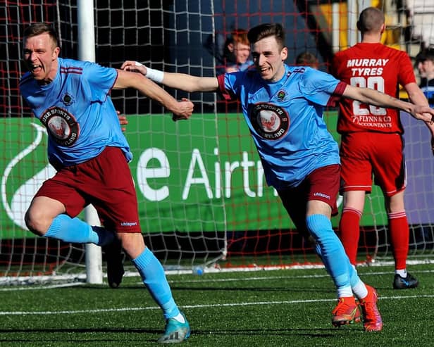 Institute's Ian Parkhill, celebrates scoring against Annagh United last week alongside Jamie Dunne, but the striker may miss tomorrow's game at Knockbreda. Picture by George Sweeney