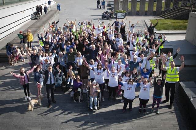 WALK FOR RUBY 2022 - The Deputy Mayor Christopher Jackson pictured with walkers at the 2022 Annual Walk for Ruby at Ebrington Square on Saturday morning.  The annual walk in memory of the late seven year-old Derry girl Ruby Lynch, who had Down's syndrome, died two-and-a-half years ago leaving her family and friends heartbroken. The Foyle Down Syndrome Trust (FDST) organised the Saturdayâ€TMs walk which is now held annually, leaving from Ebrington Square, Derry. Donations can still be made online https://www.foyledownsyndrometrust.org.     (Photos: Jim McCafferty Photography)