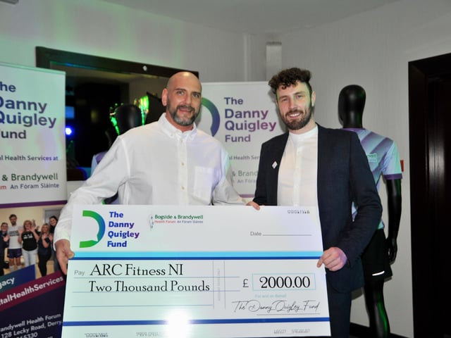Gary Rutherford from Arc Fitness being presented with a cheque worth £2,000 at the launch of The Danny Quigley Fund in the Maldron Hotel in Derry. The fund will provide finiancial support to mental health organisations in Derry and Donegal.
