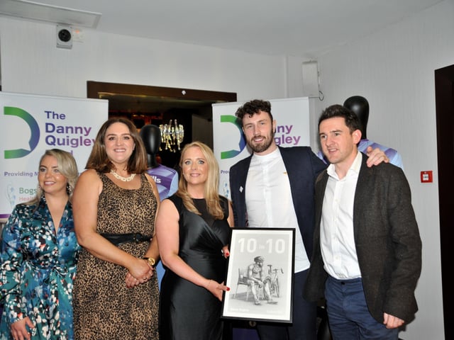 Bronagh Cooper and Aisling Hutton, Bogside and Brandywell Health Forum, with Danny Quigley and representitives from O'Neill's.