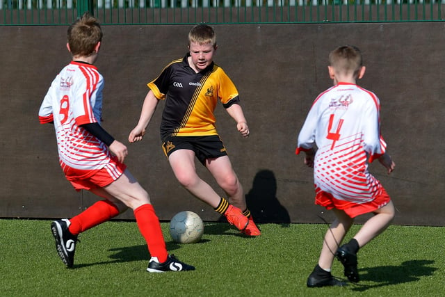 Glendermott Primary School and St Columb’s Primary School in action in the Ryan McBride Schools Cup competition. Picture by George Sweeney