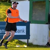GET IN! . . .City of Derry's Head coach Richard Carter celebrates his side's crucial win over Sundays well at Judges Road on Saturday. (Photo: George Sweeney)
