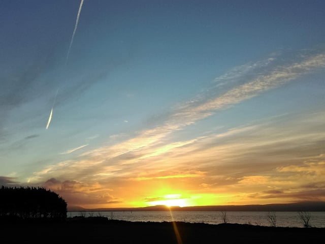Watch the sunrise from across Lough Foyle at Quigley's Point.