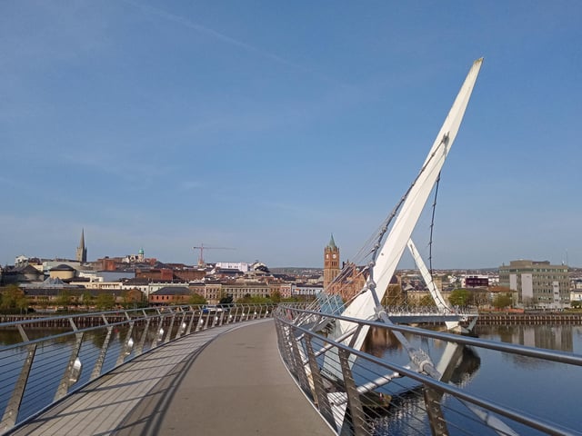 Derry's Peace Bridge and historic city centre.